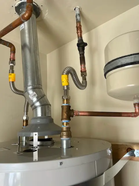 Water heater installation and plumbing repair in Country Acres